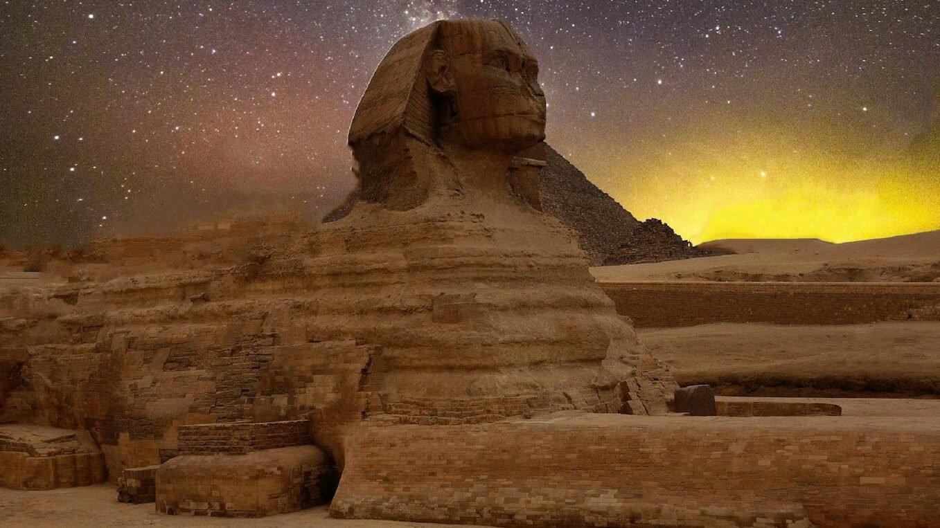 he Great Sphinx of Giza under a starry night sky, representing one of the most iconic big cat figures in mythology.
