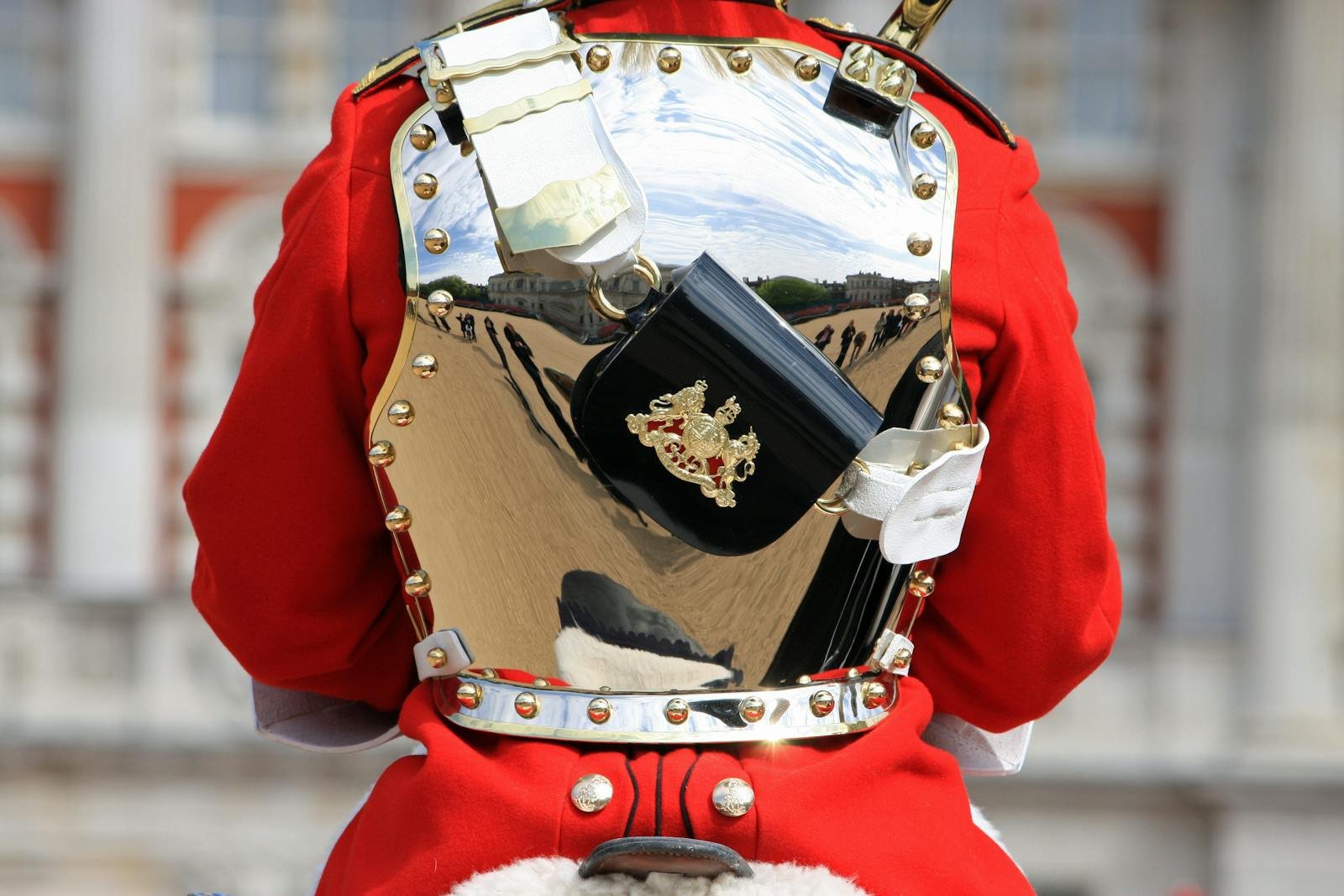 Photo by Pixabay Close-up of a Household Cavalry soldier's polished breastplate reflecting surroundings.
