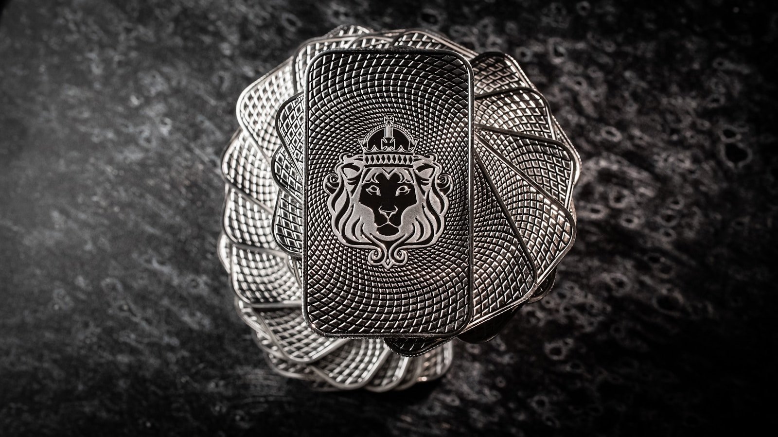 Photo by Scottsdale Mint a silver ring with a lion on it
