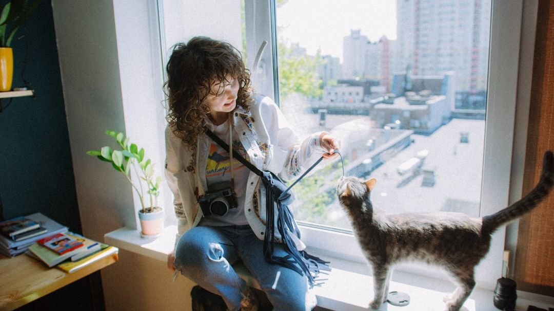 Why Your Cat Might Prefer One Human Over Another: Unraveling Feline Favoritism