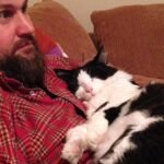 Why Does Your Cat Sleep on Your Chest (The Comfort Signal Hidden in This Behavior)