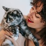 Your Cat Knows When You're Happy (and How They React to It)